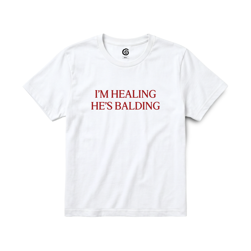 'IM HEALING HE'S BALDING' BABY TEE